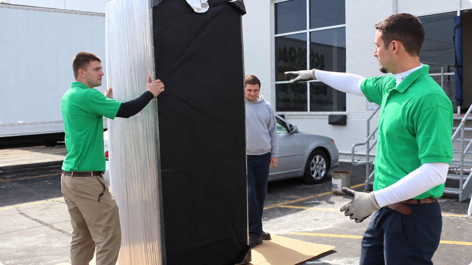 Professional movers loading a household move